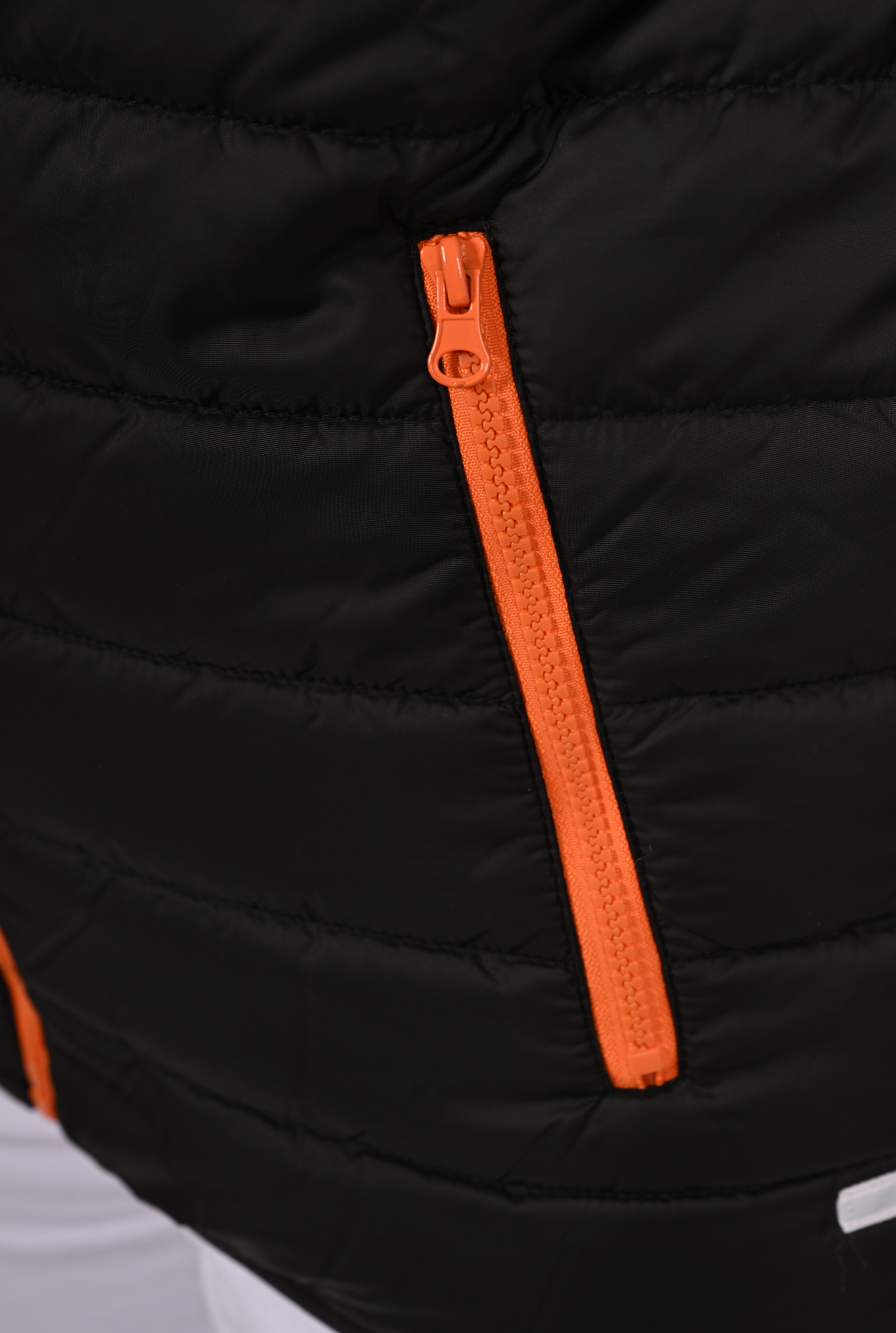 Charles Lindgren Nemo Steppjacke Schwarz Orange Jackentasche